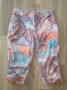 CAPRÌ PANTS SIZE 12 COLORFUL TIES ON CALF SIDES.